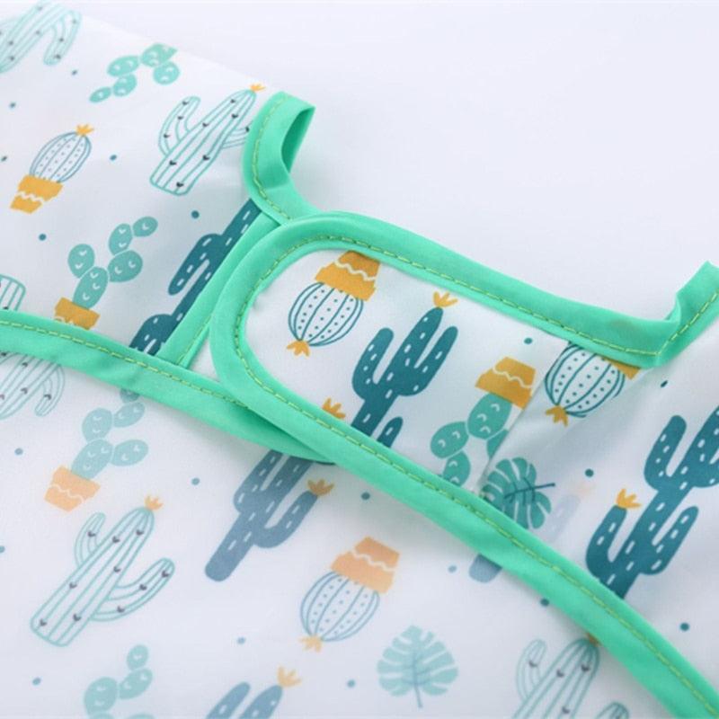 Avental de manga comprida para bebês - Proteja a roupa do seu bebê com muito mais estilo!"